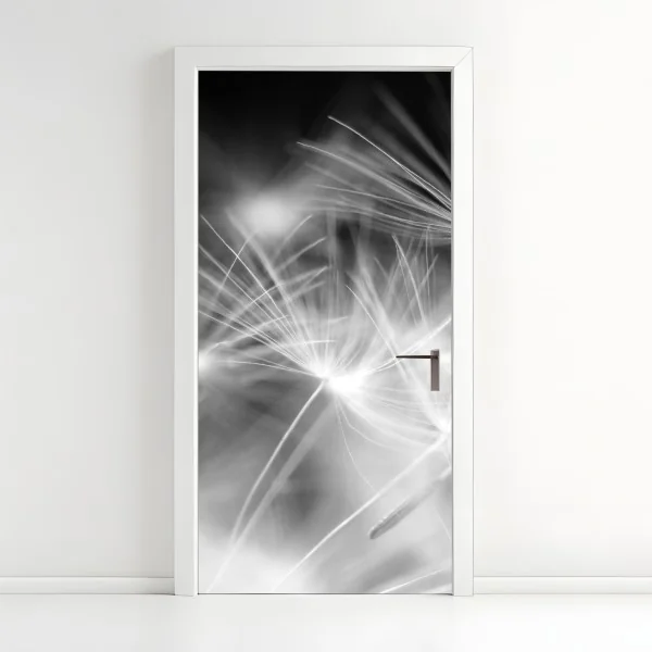 Naklejka na drzwi delikatne nasiona dmuchawca czarno-białe