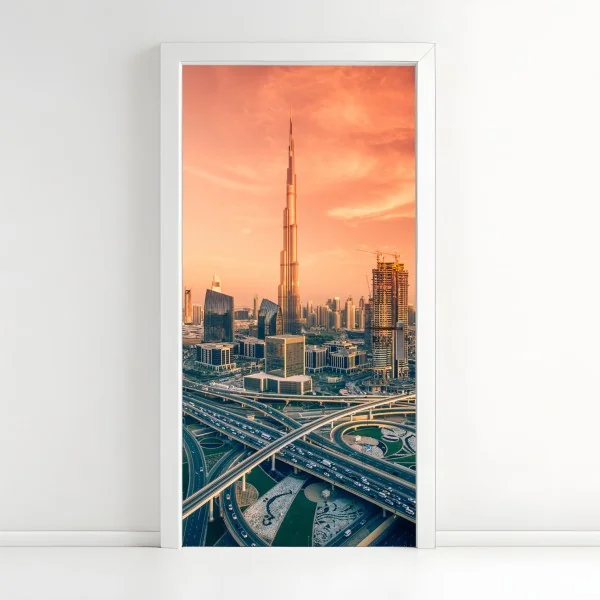 Naklejka na drzwi panorama Dubaju o zachodzie słońca