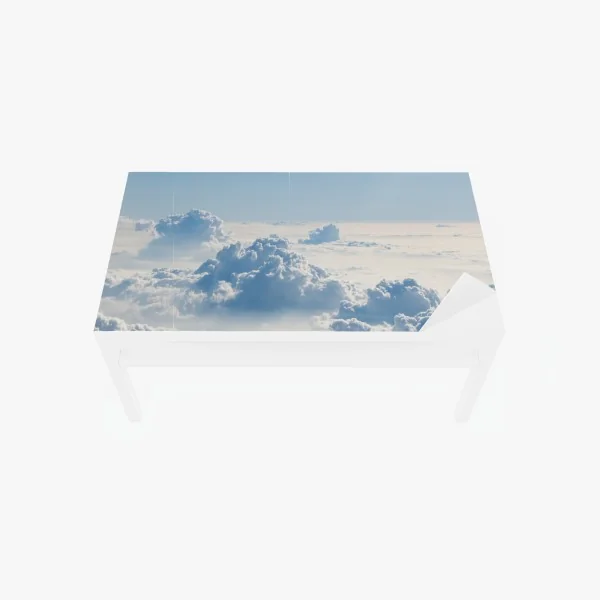 Naklejka na biurko i stół lotniczy pejzaż chmur nad błękitnym niebem