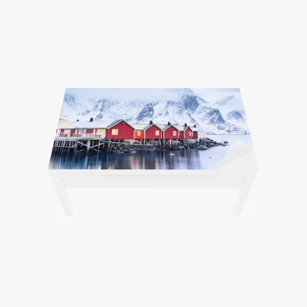 Naklejka na biurko i stół wschód słońca nad Lofotami i czerwonymi domkami