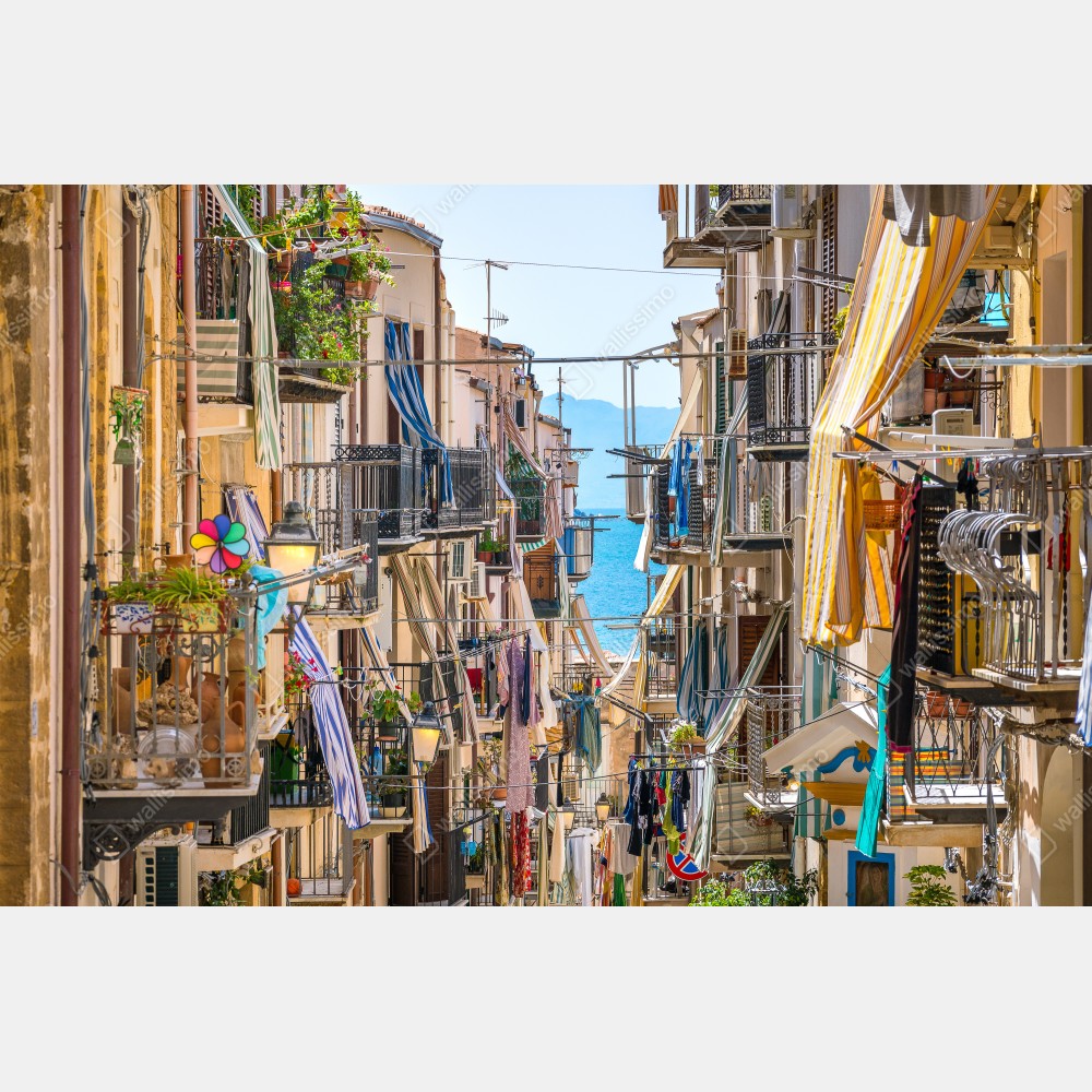 Naklejka na biurko i stół słoneczna uliczka nad morzem z widokiem na zatokę – Wallissimo® Naklejka na biurko i stół słoneczna uliczka nad morzem z widokiem na zatokę – Wallissimo®