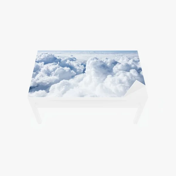 Naklejka na biurko i stół widok z lotu ptaka: miękkie chmury i błękitne niebo