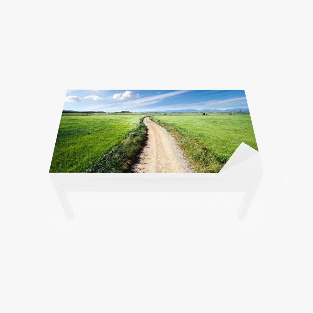 Naklejka na biurko i stół wijąca się wiejska droga przez zielone łąki – Wallissimo® Naklejka na biurko i stół wijąca się wiejska droga przez zielone łąki – Wallissimo®