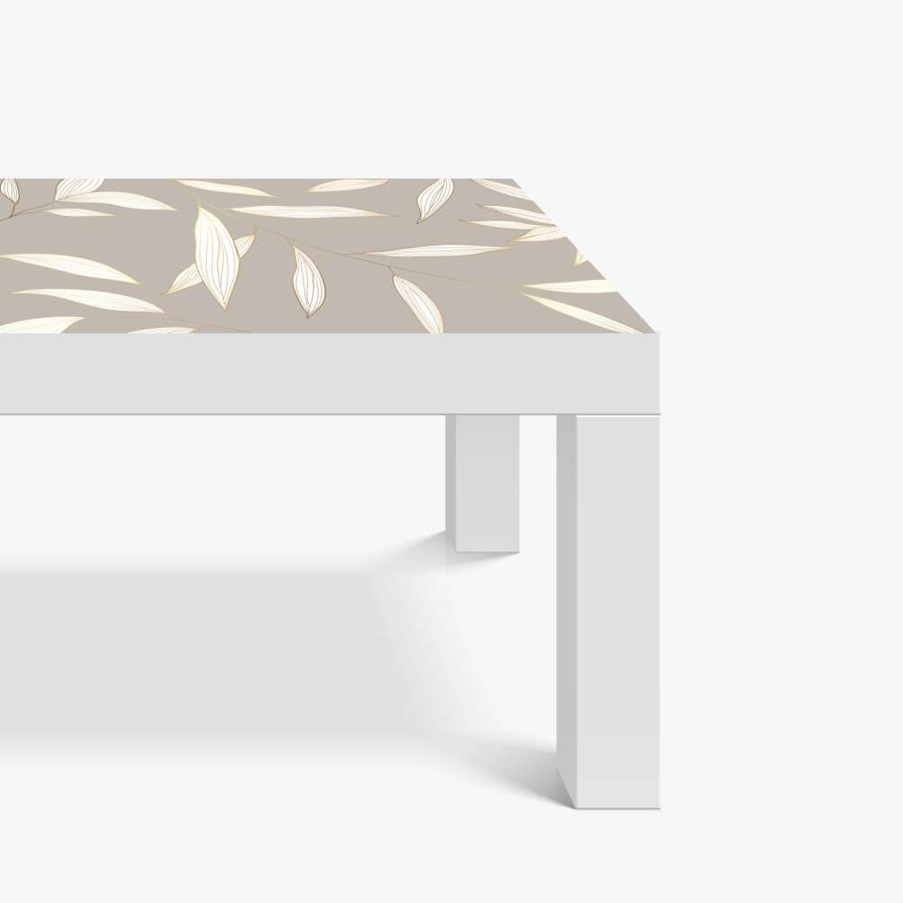 Naklejka na biurko i stół delikatne liście z złotym obrysem na beżowym tle – Wallissimo® Naklejka na biurko i stół delikatne liście z złotym obrysem na beżowym tle – Wallissimo®