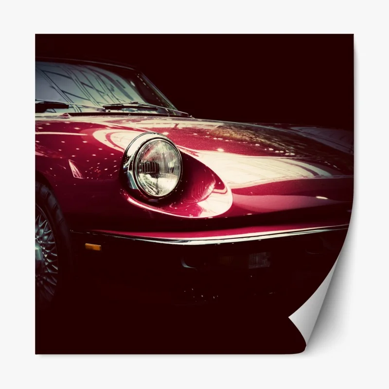 Naklejka repozycjonowalna zbliżenie klasycznego czerwonego samochodu sportowego