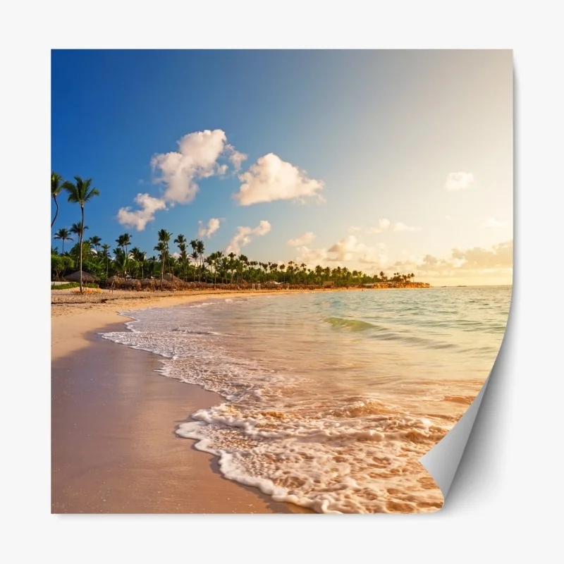 Naklejka repozycjonowalna tropikalny zachód słońca na plaży z sylwetkami palm