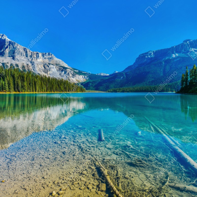 Naklejka repozycjonowalna turkusowe alpejskie jezioro z odbiciami gór – Wallissimo® Naklejka repozycjonowalna turkusowe alpejskie jezioro z odbiciami gór – Wallissimo®