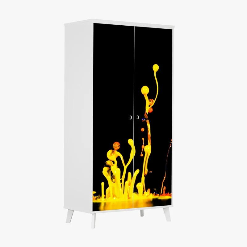 Naklejka na szafę intensywny żółty rozbryzg farby na czarnym tle