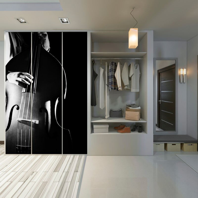 Naklejka na szafę kontrabasista w dramatycznym świetle – Wallissimo® Naklejka na szafę kontrabasista w dramatycznym świetle – Wallissimo®