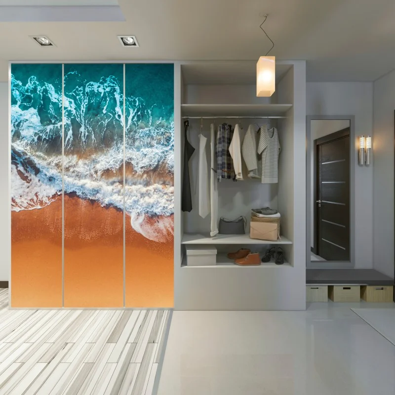 Naklejka na szafę lotnicze ujęcie turkusowych fal na piaszczystej plaży – Wallissimo® Naklejka na szafę lotnicze ujęcie turkusowych fal na piaszczystej plaży – Wallissimo®