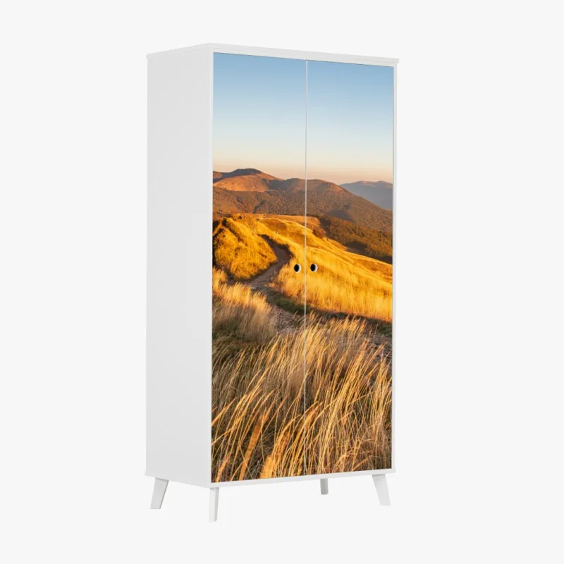 Naklejka na szafę złota grzęda górska o zachodzie słońca