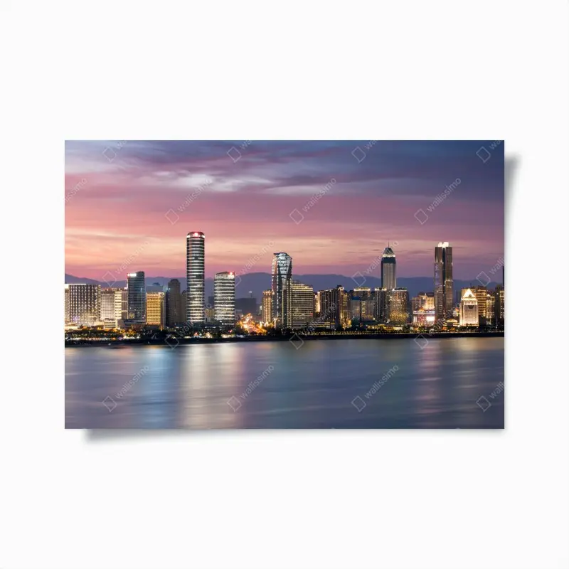 Plakat spokojna panorama miasta o zmierzchu