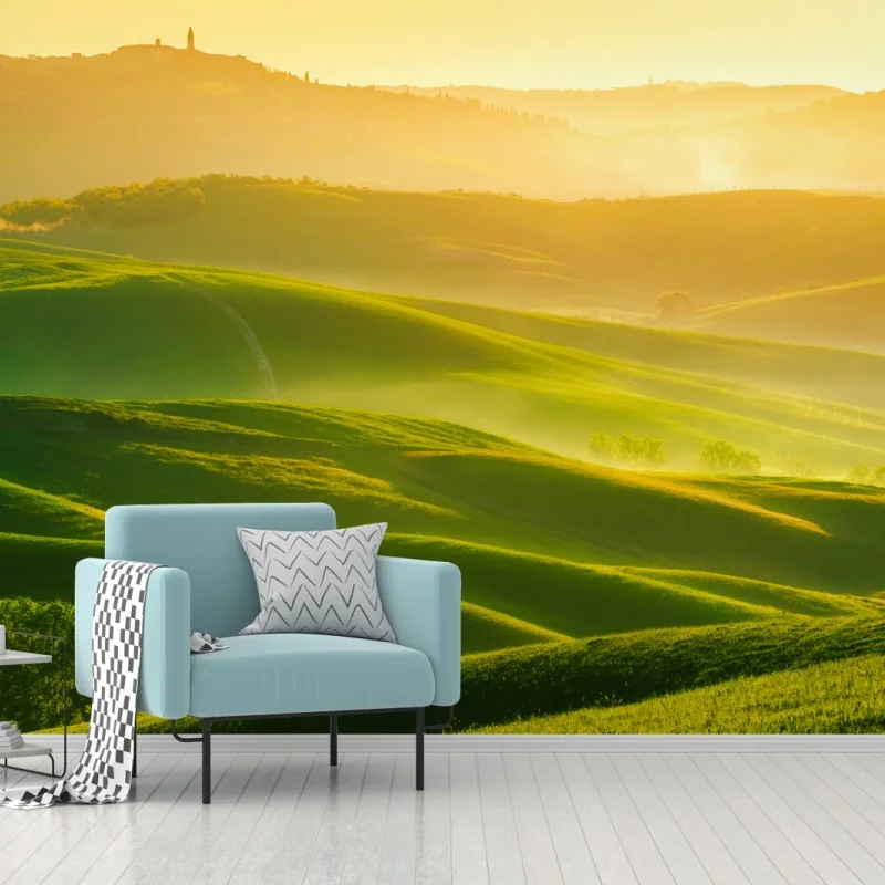 Fototapeta złoty wschód słońca nad zielonymi falującymi wzgórzami – Wallissimo®