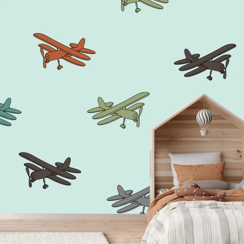 Fototapeta wzór z dwupłatowcami na turkusowym tle – Wallissimo® Fototapeta wzór z dwupłatowcami na turkusowym tle – Wallissimo®