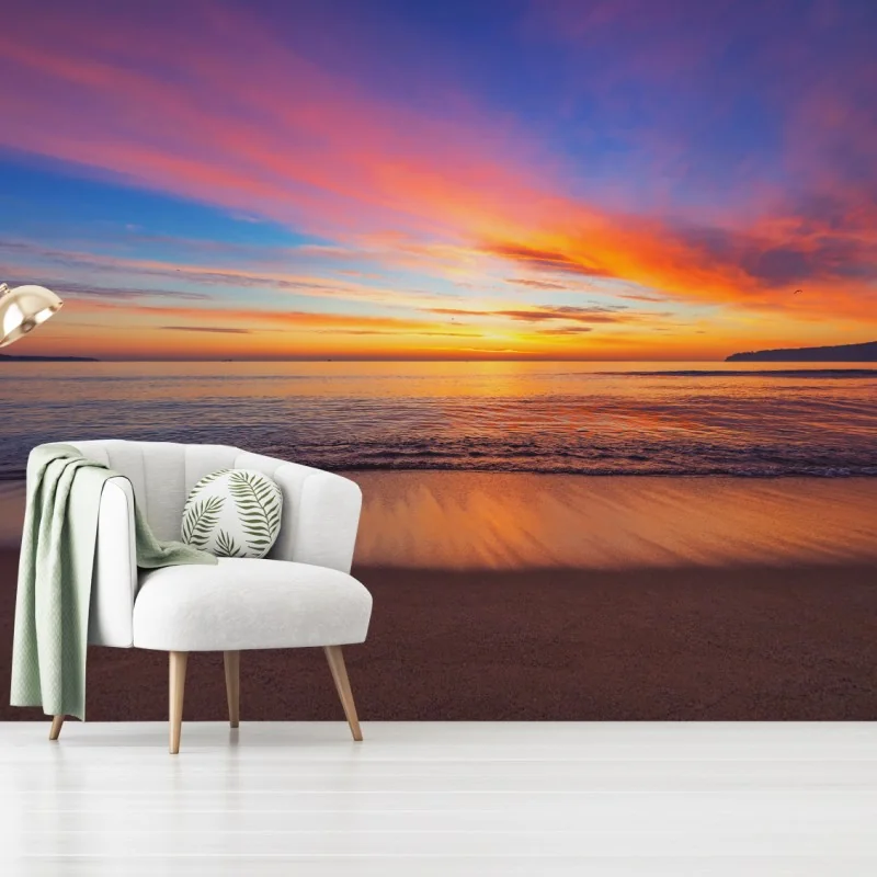 Fototapeta żywy wschód słońca nad spokojną plażą – Wallissimo® Fototapeta żywy wschód słońca nad spokojną plażą – Wallissimo®