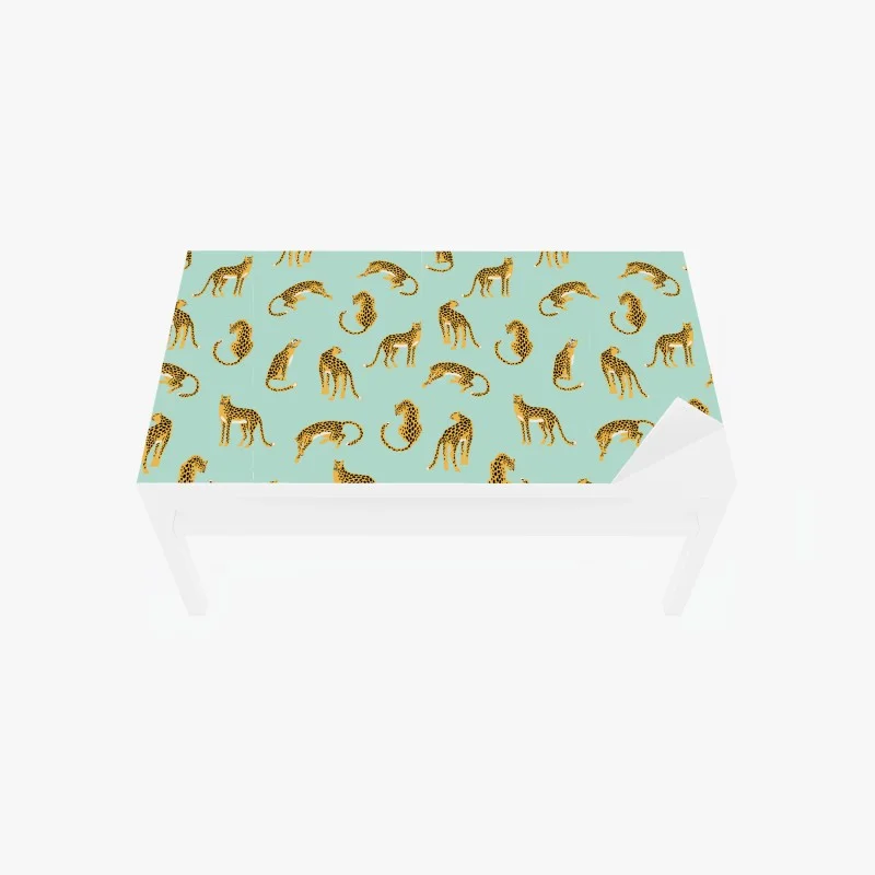 Naklejka na biurko i stół zabawny wzór gepardów na turkusowym tle