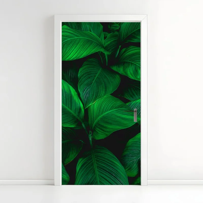 Naklejka na drzwi bujne tropikalne liście