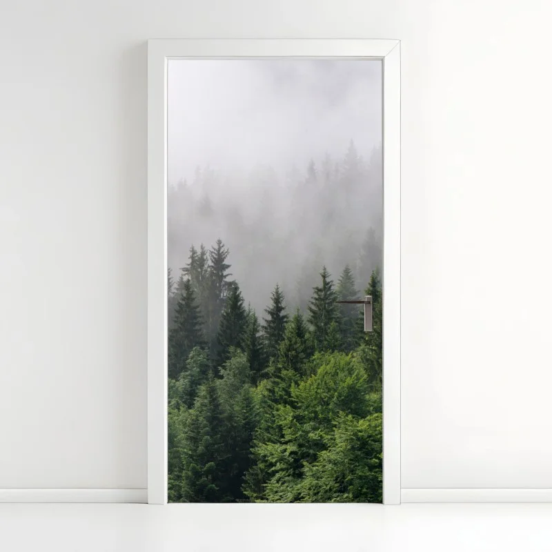 Naklejka na drzwi mglisty las iglasty panorama