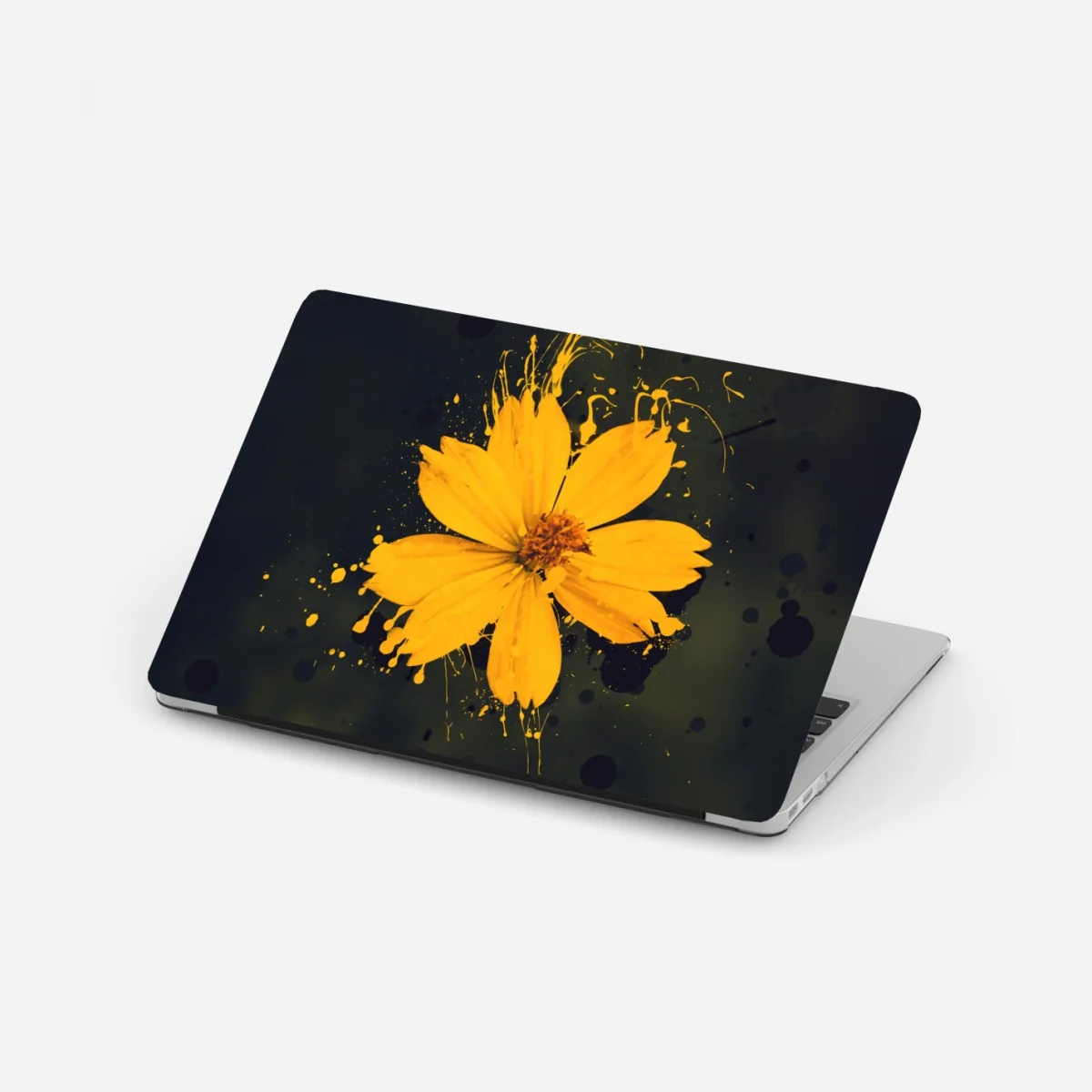 Naklejka na laptopa intensywny żółty kwiat na ciemnym tle – Wallissimo®