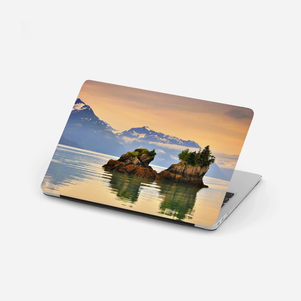 Naklejka na laptopa spokojne odbicia wysp o zachodzie słońca – Wallissimo® Naklejka na laptopa spokojne odbicia wysp o zachodzie słońca – Wallissimo®