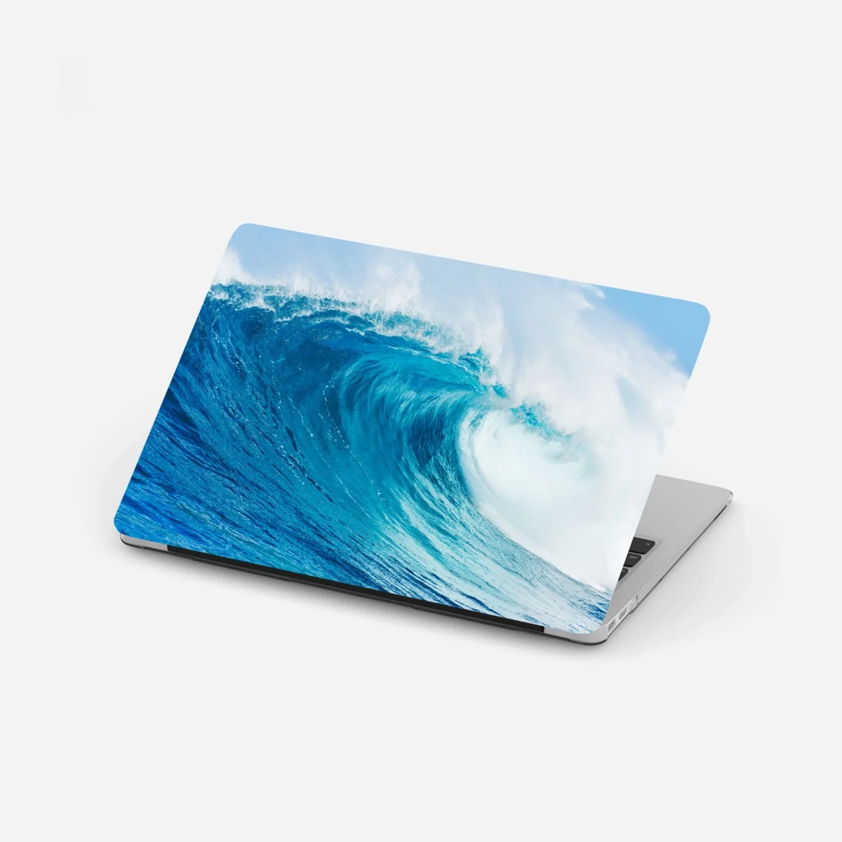 Naklejka na laptopa majestatyczna niebieska fala oceaniczna – Wallissimo® Naklejka na laptopa majestatyczna niebieska fala oceaniczna – Wallissimo®