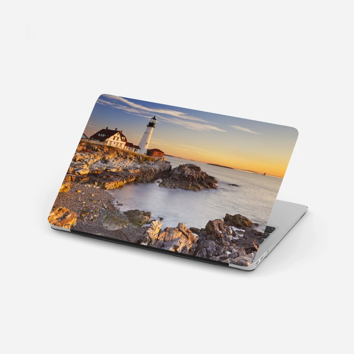 Naklejka na laptopa Portland Head latarnia morska o wschodzie słońca – Wallissimo® Naklejka na laptopa Portland Head latarnia morska o wschodzie słońca – Wallissimo®
