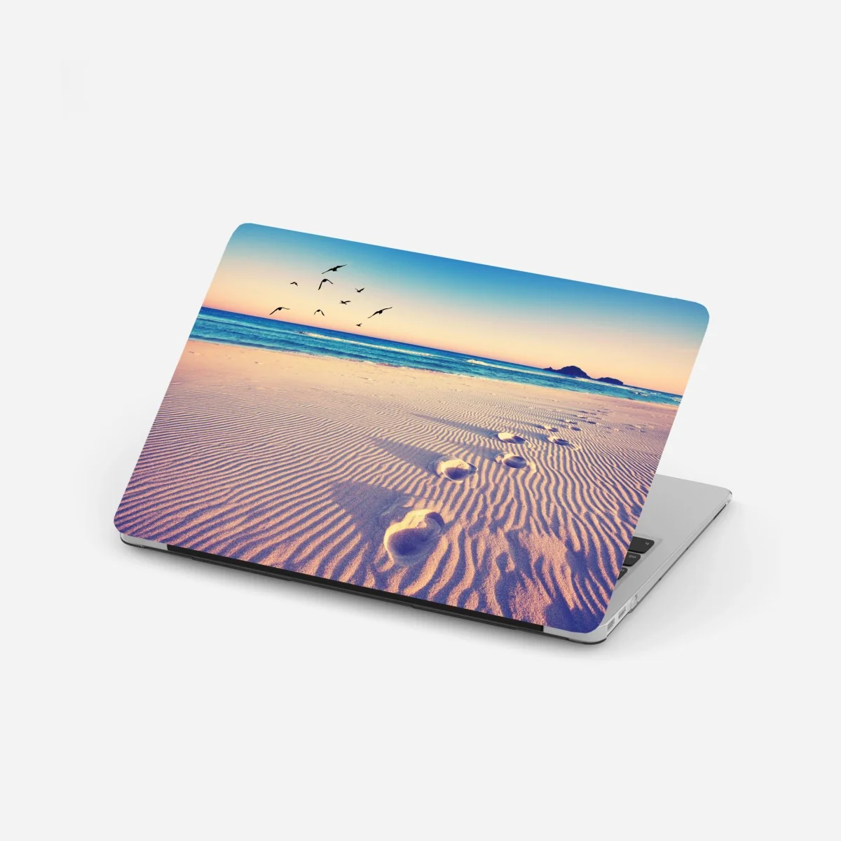 Naklejka na laptopa magiczne odciski na letniej plaży – Wallissimo®