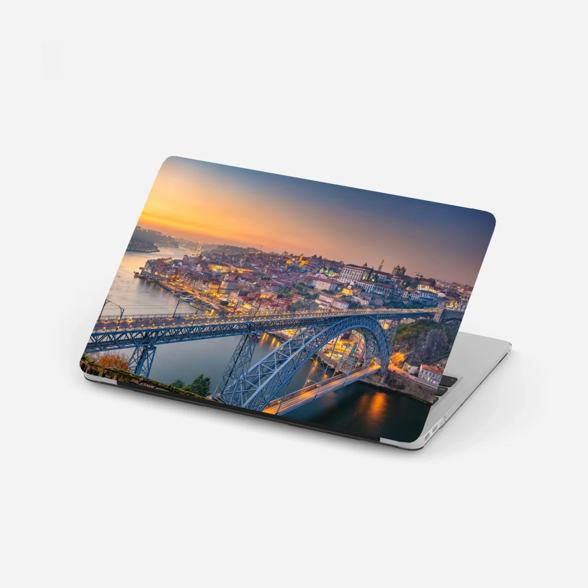 Naklejka na laptopa panorama Porto o zmierzchu z mostem Dom Luís I – Wallissimo® Naklejka na laptopa panorama Porto o zmierzchu z mostem Dom Luís I – Wallissimo®