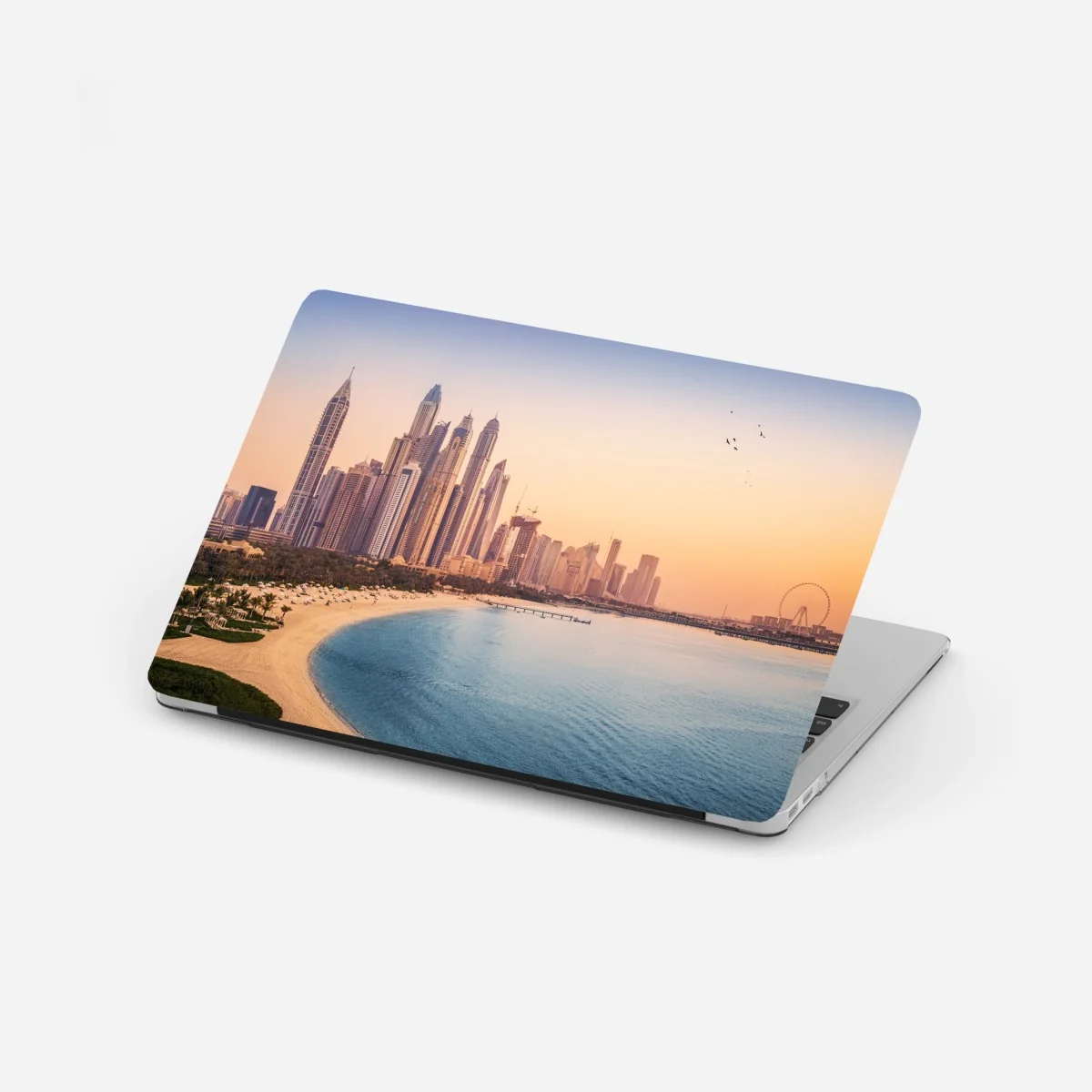 Naklejka na laptopa Dubaj panorama miasta o zachodzie słońca – Wallissimo® Naklejka na laptopa Dubaj panorama miasta o zachodzie słońca – Wallissimo®