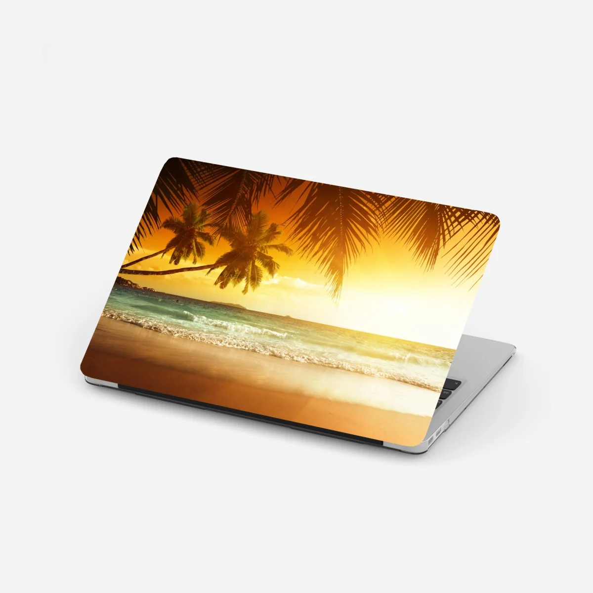 Naklejka na laptopa złoty zachód słońca na Karaibach – Wallissimo®