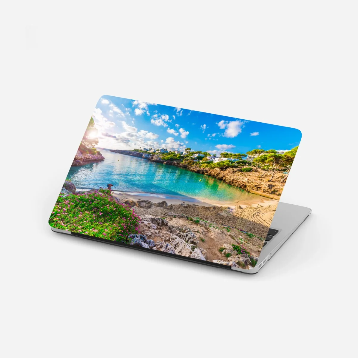 Naklejka na laptopa słoneczna Cala Esmeralda zatoka w turkusie – Wallissimo® Naklejka na laptopa słoneczna Cala Esmeralda zatoka w turkusie – Wallissimo®