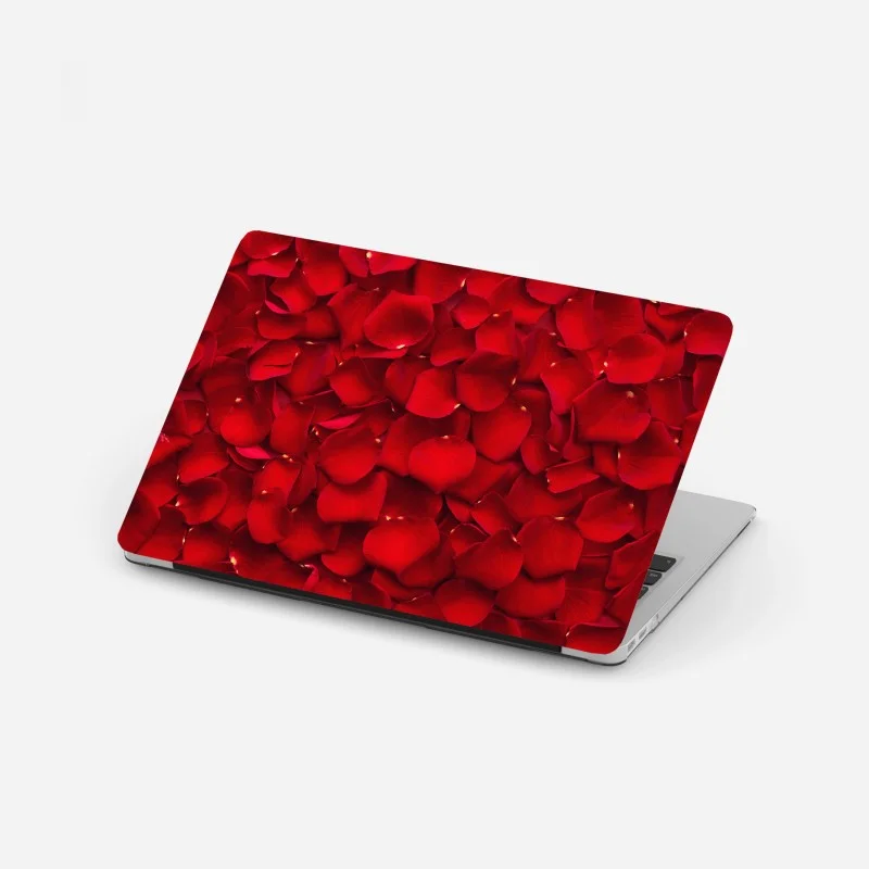 Naklejka na laptopa czerwone płatki róż tło
