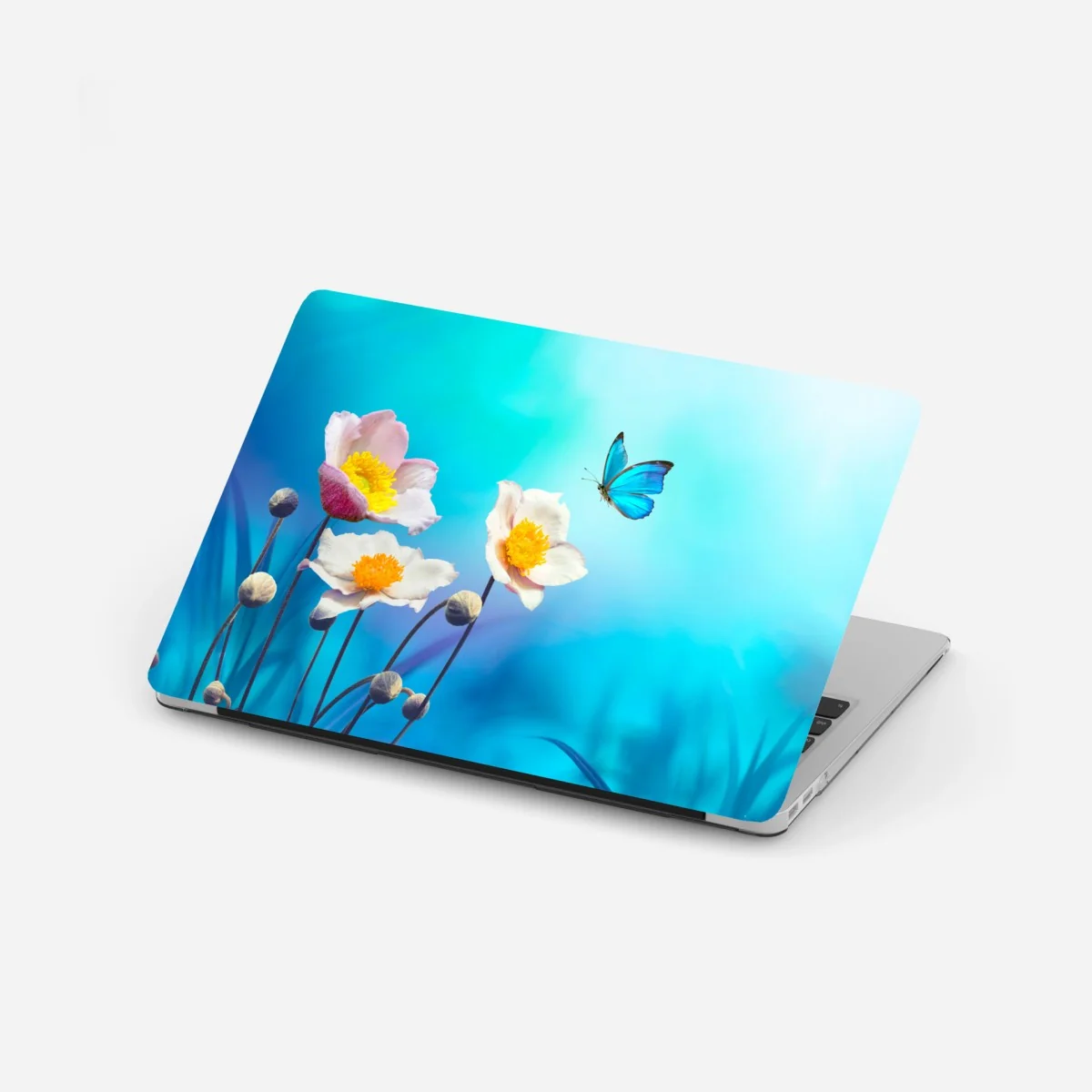 Naklejka na laptopa delikatne różowe anemony i niebieski motyl – Wallissimo® Naklejka na laptopa delikatne różowe anemony i niebieski motyl – Wallissimo®