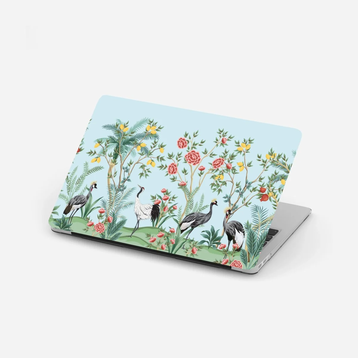 Naklejka na laptopa ogród z żurawiami i kwiatami – Wallissimo® Naklejka na laptopa ogród z żurawiami i kwiatami – Wallissimo®