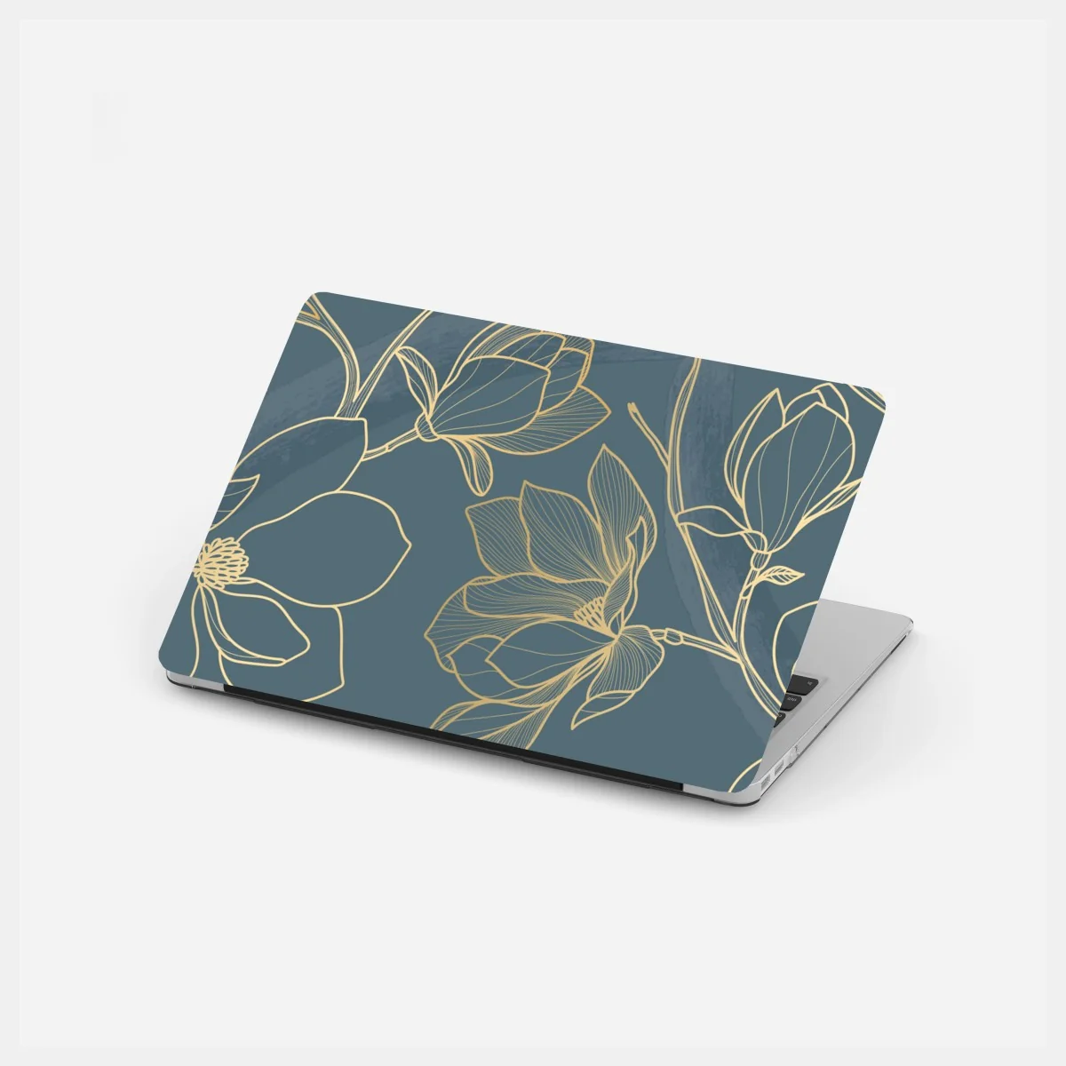 Naklejka na laptopa złota magnolia na turkusowym tle – Wallissimo® Naklejka na laptopa złota magnolia na turkusowym tle – Wallissimo®