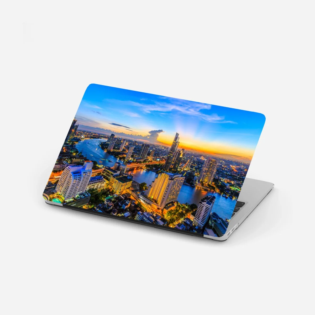 Naklejka na laptopa tętniąca życiem panorama miasta o zmierzchu – Wallissimo® Naklejka na laptopa tętniąca życiem panorama miasta o zmierzchu – Wallissimo®