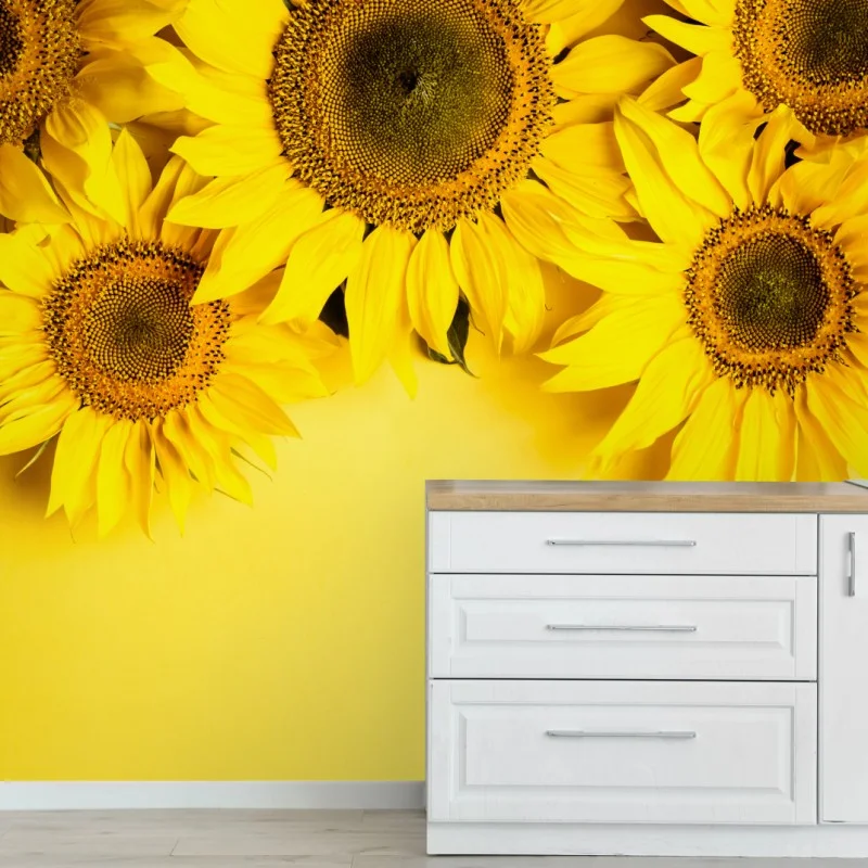 Fototapeta jasny bukiet słoneczników na żółtym tle
