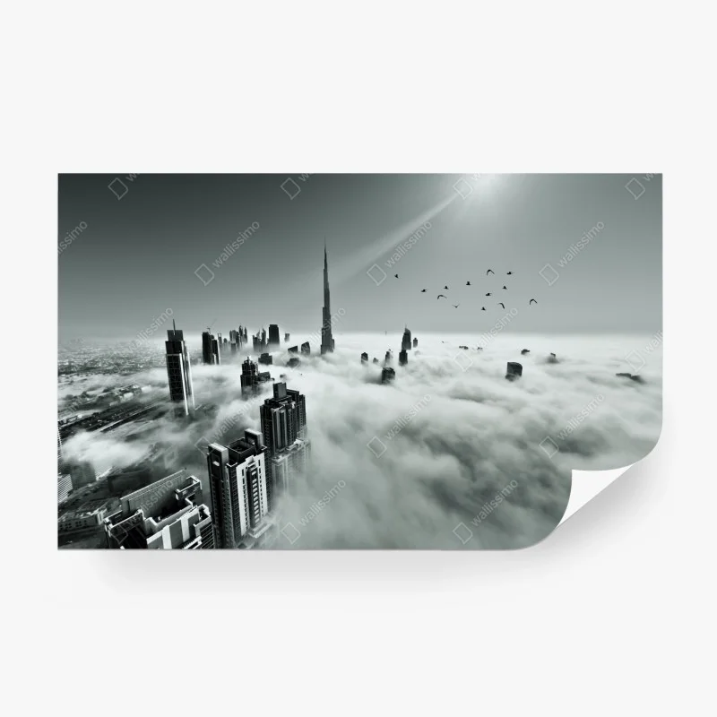 Fototapeta mglista panorama Dubaju ponad chmurami