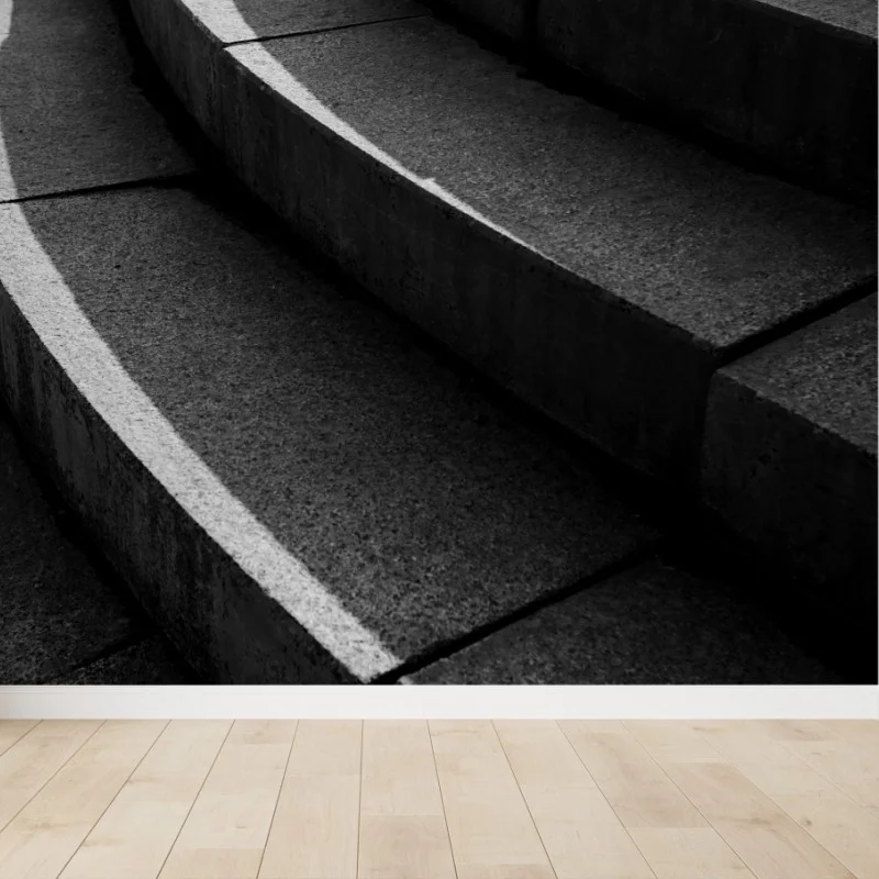 Fototapeta zakrzywione betonowe schody w cieniu