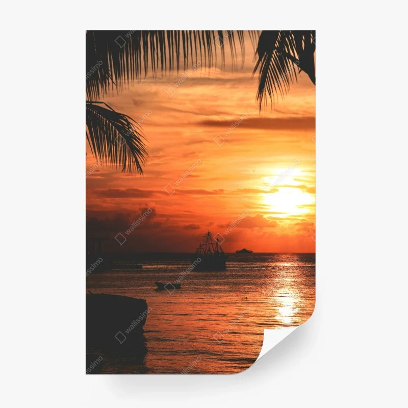 Fototapeta tropikalny zachód słońca nad morzem