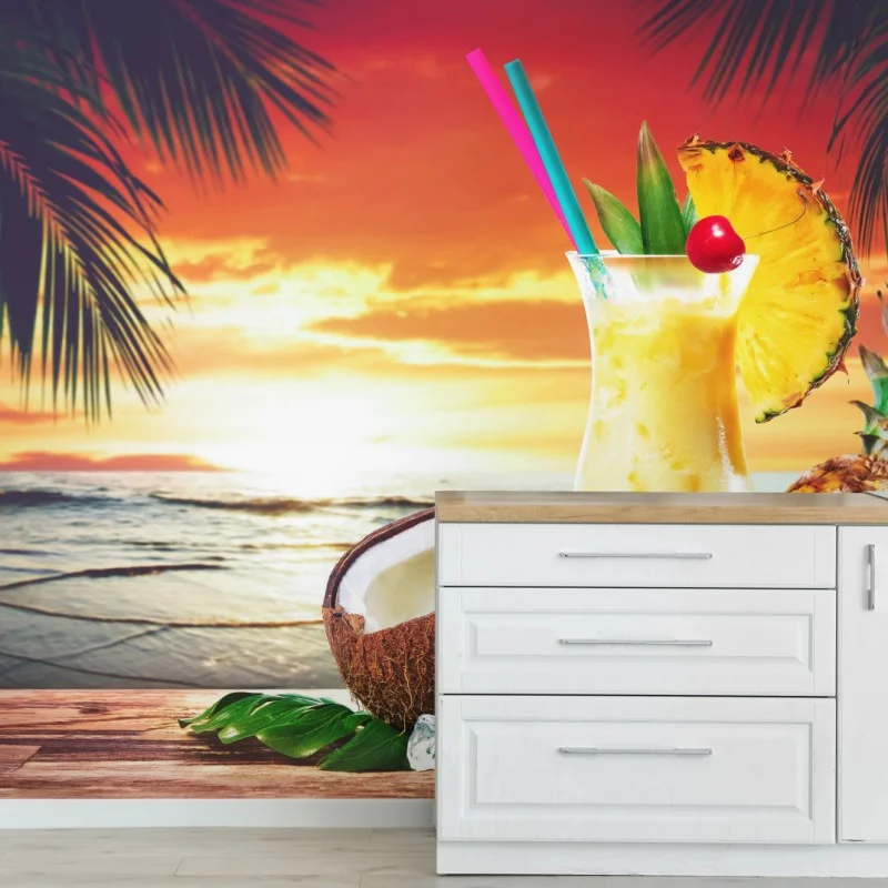 Fototapeta tropikalny zachód słońca na plaży z koktajlem