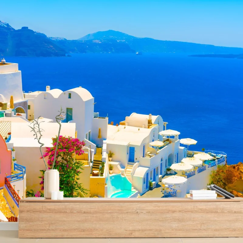 Fototapeta słoneczny widok na Santorini: białe domy i błękit morza