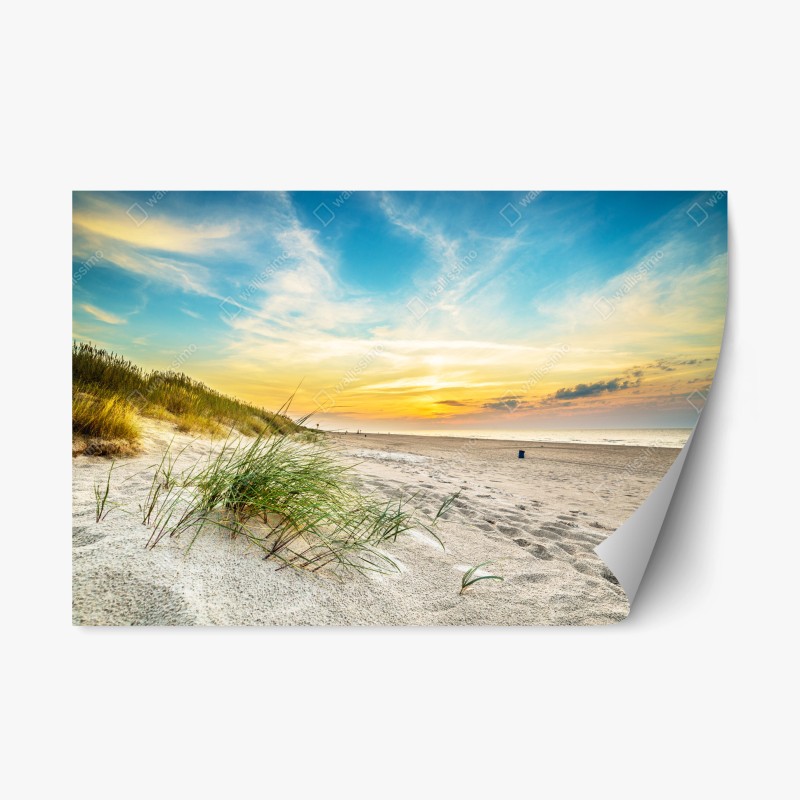 Naklejka repozycjonowalna zachód słońca nad spokojnymi wydmami