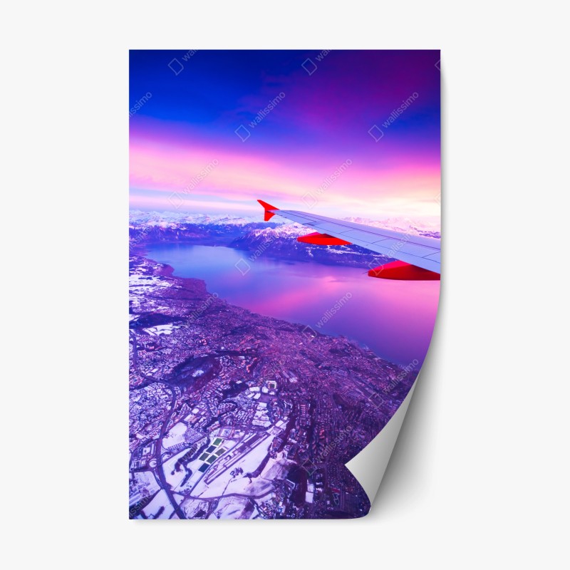 Naklejka repozycjonowalna panorama miasta nad jeziorem z lotu ptaka o zachodzie