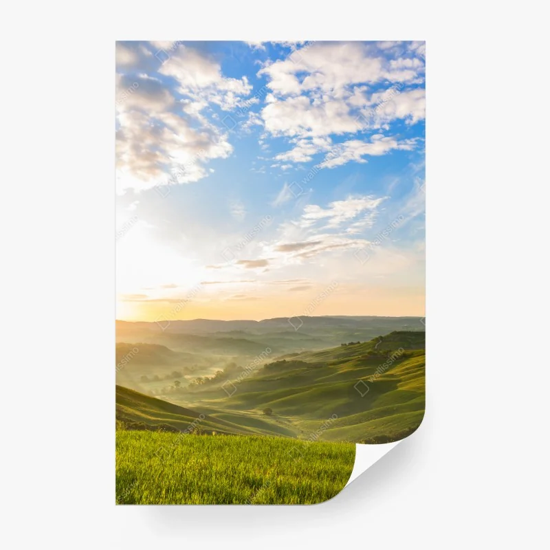 Fototapeta wschód słońca nad mglistymi pagórkami