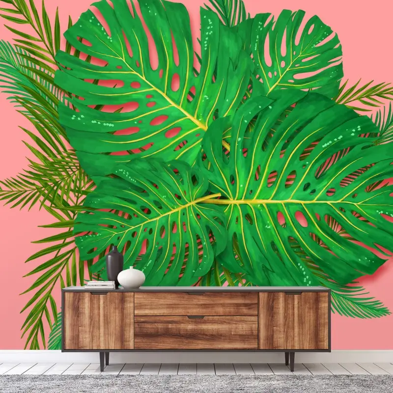 Fototapeta monstera i palmy na różowym tle
