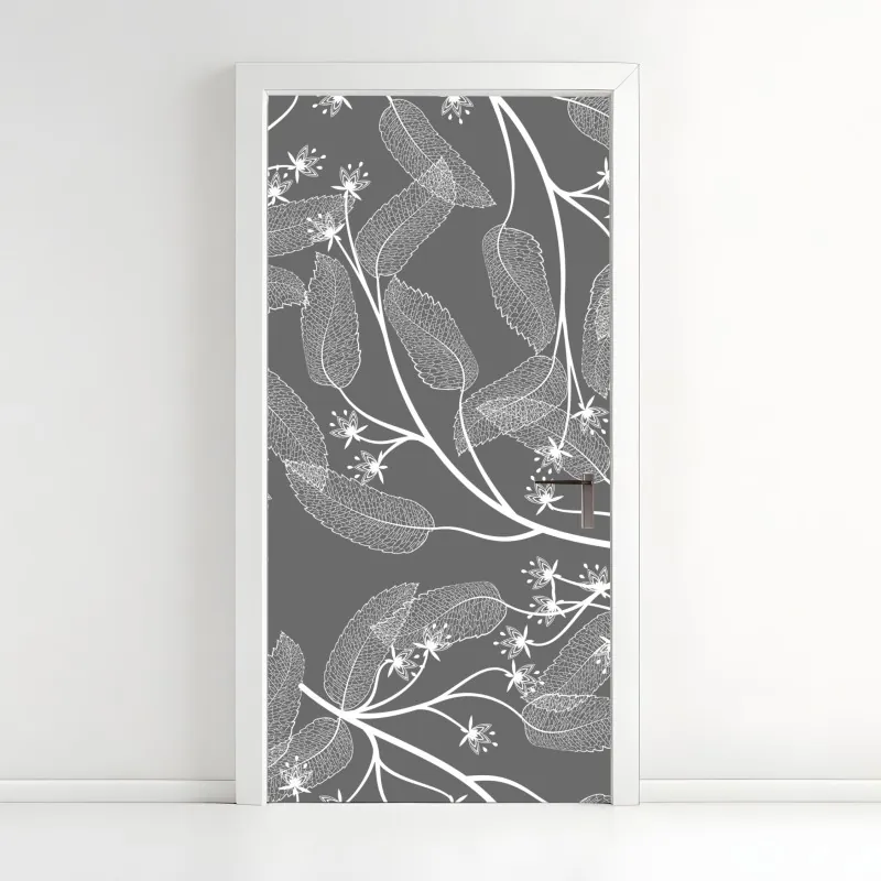 Naklejka na drzwi delikatne białe liście na szarym tle