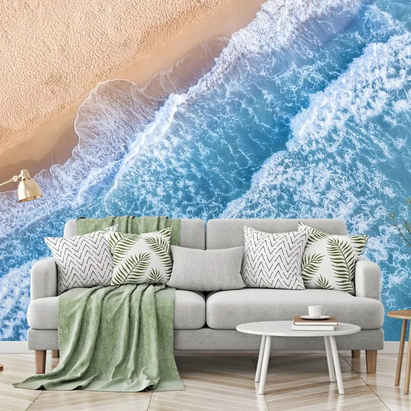 Fototapeta widok z lotu ptaka na turkusowe fale i piaszczystą plażę