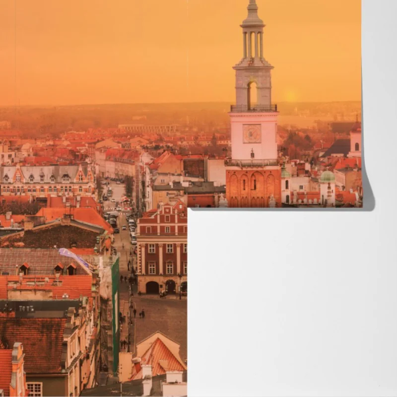 Fototapeta ciepły zachód słońca nad zabytkowymi dachami miasta – Wallissimo® Fototapeta ciepły zachód słońca nad zabytkowymi dachami miasta – Wallissimo®