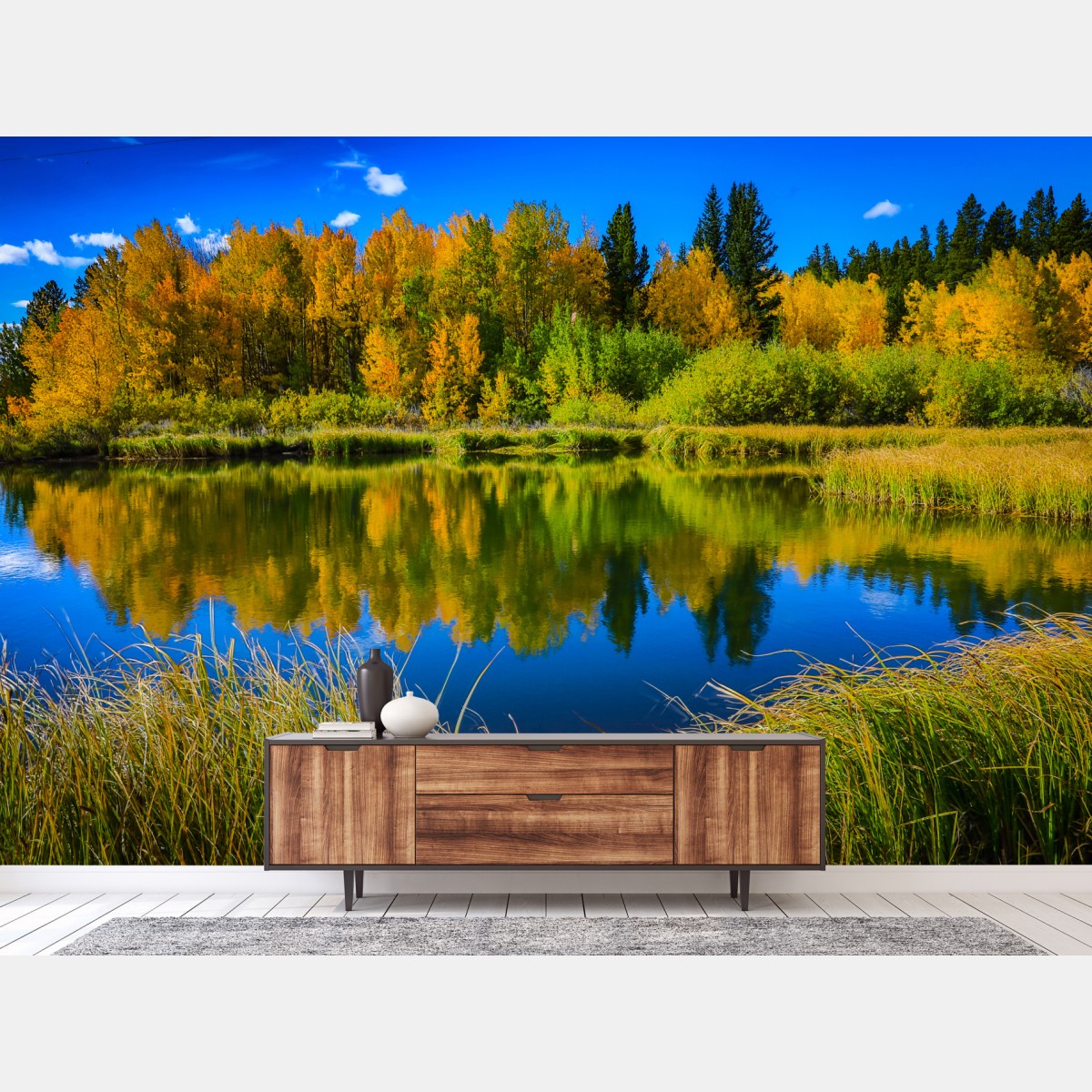 Wall mural autumn trees reflected on a glassy lake